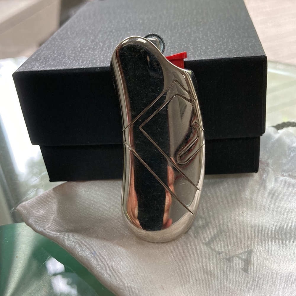 Sterling Silver, High polish item. Original Furla pouch. Never used.